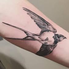 Tremendous swallow tattoo design on arm; 100 Best Swallow Tattoos With Meanings And Ideas Body Art Guru