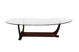 The centerpiece of any living room, often also poses as the focal point of the overall living room. Adrian Pearsall Mid Century Modern Biomorphic Glass Top Walnut Coffee Table Mary Kay S Furniture