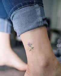 Small Purple Rose Tattoo On The Ankle Tattoo Artist Sol Tattoo Tattoos Flower Tattoo On Ankle Violet Tattoo
