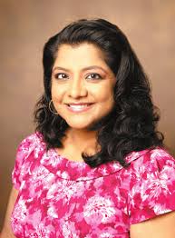 Local artist Clover Honey paints small town joy