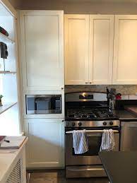 Update your kitchen storage with stock cabinets at lowe's. Gorgeous Off White Wood Kitchen Cabinets Shaker Full Overlay Island Desk Office Area Little Green Kitchens