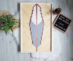 A twist on the normal succulent plant holder, the southwest hanging clay planter adds a contemporary touch and can easily bring style to any space. Feather Wood Copper Wood Wall Art Boho Wood Art Wood Etsy Wood Artwork Boho Wall Art Wood Wall Art