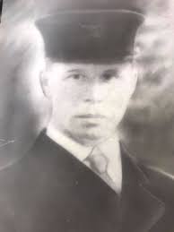 Grandfather with the tilted hat. He was one of the first two paid firemen  in Aiken SC.