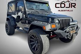 Image result for Brilliant Black 2003 Jeep