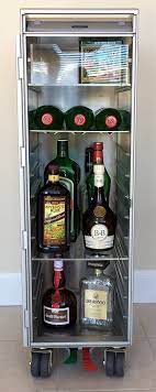 How To Organize Your Wine And Spirits In A Skycart The Authentic But Factory New Airline Trolley For Home Use Airlinetr Perfect Bar Cart Bar Cart Myers Rum