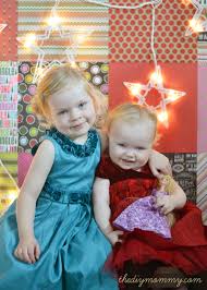 When i started photography i was very interested in learning everything i can about studio photography. Make Diy Christmas Photo Backdrops With Scrapbook Paper The Diy Mommy