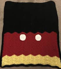 My Crochet Afghan Blanket Inspired By Mickey Mouse Easy To Make And My Toddler Loves It Crochet Mickey Mouse Crochet Disney Baby Afghan Crochet