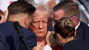 Donald Trump shot in the ear by lone gunman. Former president is 'fine'