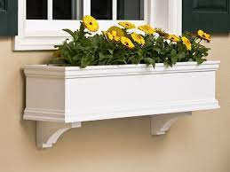 It has a sturdy frame, weighs 16 pounds, and is meant to hold three individual flower pots. Pvc Window Boxes The Estate Collection Composite Flower Boxes