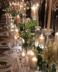Mindy Weiss On Instagram Dinner Table Filled With Candles And Greens A Touch Of Floral Wedding Table Settings Flower Centerpieces Wedding Candle Lit Wedding