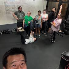 Sometimes all you need to get through the day to day, rage-inducing news  cycle is a friendly group of faces and the desire to collectively move  thousands of pounds of iron! Have