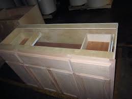 What are the shipping options for unfinished bathroom vanities? 48 X 21 Inch Oak Bathroom Vanity Drawer Base
