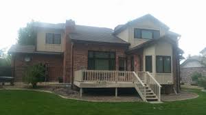 Select a darker gray paint for a high ceiling in a large room. Exterior Colors To Pair With Brick In Arvada Arvada