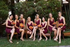 Look At The Orange Pop Against The Burgundy Wine Gowns I Don T Even Like Orange But I Love The Pop Wine Bridesmaid Dresses Bridesmaid Dress Colors Bridesmaid