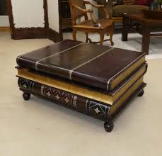 Glass top stacked book coffee table; Encore Furniture Gallery Maitland Smith Leather Wrapped Stacked Book Coffee Table