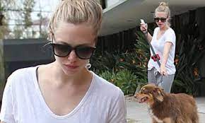 Amanda Seyfried erases all trace of racy Linda Lovelace as she dresses down  in sweats to walk dog Finn 
