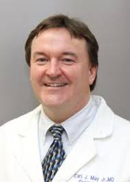 Dr. Carl J. May, MD