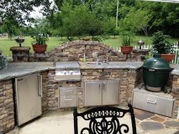 A large round griddle (with a fire pot in the middle) is of stainless steel. 27 Best Outdoor Kitchen Ideas And Designs For 2021