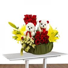 Beauty Of Nature Basket Rose Lilies Flowers And Teddy In 2020 Flower Delivery Best Flower Delivery Lily Flower