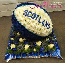 These items are dispatched with qualifying orders of £20 or more, and are eligible for free delivery. Rugby Ball Funeral Flowers Buy Online Or Call 01206 843461