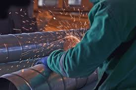 A welding helmet is a type of headgear used when performing certain types of welding to protect the eyes, face and neck from flash burn, ultraviolet light, sparks, infrared light, and heat. Download Arc Welding Of A Steel In Construction Site For Free Arc Welding Welding Free Photos