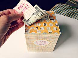 Stuff the roll of money into the bottom of the tissue box, and place the card stock so pull up is sticking out of the top. Diy Creative Way To Give A Cash Gift Using A Kleenex Box