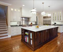 white kitchen with dark stained island