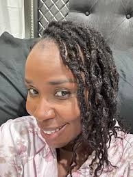 Growing dreadlocks with synthetic extensions