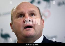 Deaf Australian Olympic decathlete Dean Barton-Smith speaks during the  launch of his book 'Think Again' in Sydney, Wednesday, February 19, 2020.  (AAP Image/Joel Carrett) NO ARCHIVING ** STRICTLY EDITORIAL USE ONLY, NO