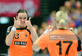 The line player of győri audi eto kc and the dutch national team. Netherlands Yvette Broch L Celebrates With Her Teammate Cornelia Groot After Scoring A Goal During The Women S Handball Handball Handball World Championship