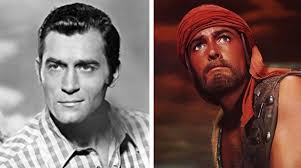 CLINT WALKER dated Donna Douglas in the late 1960's after his  divorce...here they are at Christmas time 1968.