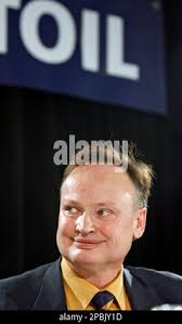 North American Oil Sands president and CEO Pat Carlson listens during an  announcement in Calgary, Friday, April 27, 2007. Norwegian oil company  Statoil ASA said Friday it has agreed to take over Canada's North American  Oil Sands Corp. in a $2 billion ...