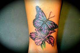 Pin By Renae Davis On Tats Butterfly Wrist Tattoo Butterfly With Flowers Tattoo Flower Wrist Tattoos