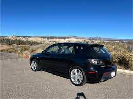Image result for Electric Blue 2007 Mazda3
