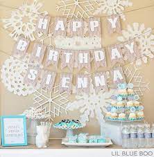 Want to throw the perfect snowflake themed winter party? A Frozen Winter Birthday Party And Free Printables Winter Birthday Parties Snowflake Party Frozen Birthday