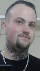 Wanted man found at campsite, arrested after trying to escape into river