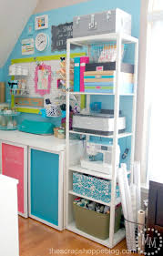 How to organize a craft room ~ this craft room color palette and pattern play is simply gorgeous! Craft Room Reveal The Scrap Shoppe Craft Storage Cabinets Craft Room Shelves Craft Room Storage
