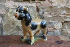 Vintage chalkware baby statue with removable diapers. Vintage Chalkware Wall Plaques Carnival Chalkware