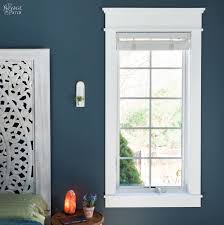 The trim is all whitewashed like the pine shiplap walls. Diy Craftsman Style Trim For Windows And Doors The Navage Patch