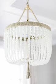 Malibu Chandelier In Milk Glass And Natural Raffia Beautiful Homes Of Instagram Beaded Chandelier Wood Bead Chandelier Glass Bead Lighting
