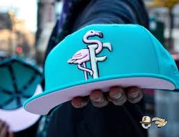It is worn on the field of play by athletes worldwide, including the mlb, nhl, nfl, nba, and minor league baseball. Flamingos Teal Pink 59fifty Fitted Hat By The Clink Room X New Era Strictly Fitteds
