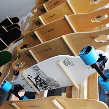 I cut four 10″ by 6″ stretcher for the back and then screwed them into place. Mica Hardware Make A Storage Rack For Skateboards
