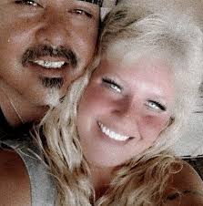 How often is County Road 2000 North oiled or paved?