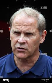 Michigan head coach John Beilein, right, gives instructions to point guard Jerret  Smith (1) in the first half of an exhibition college basketball game with  Ferris St, Thursday, Nov. 01, 2007, in