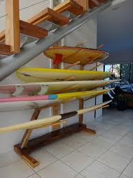 The design of the surfboard rack is very straight forward. Jeri S Organizing Decluttering News Very Cool Surfboard Storage From Australia
