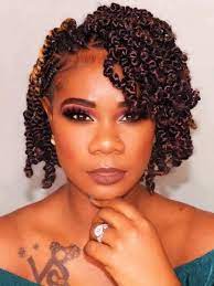 The hairstyle is braided using smaller twists with a red tone. 20 Passion Twist Hairstyles That Will Protect Your Hair The Trend Spotter