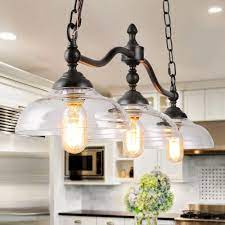 The right countertop can make it all the better. Lnc Barn 38 In 3 Light Black Modern Farmhouse Chandelier Rustic Kitchen Island Pendant Light With Clear Glass Shades A03297 The Home Depot Farmhouse Light Fixtures Hanging Light Fixtures Modern Farmhouse Chandelier
