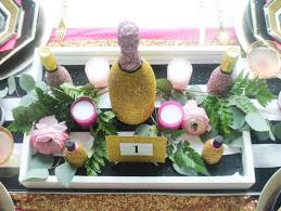 Almost anything can serve as décor for creative people. Diy Glitter Champagne Bottle Centerpiece Favor Fun365