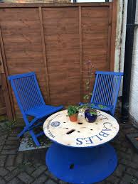 Pin By Lisa Beatty On Garden Old Wooden Chairs Cable Drum Table Outdoor Furniture Sets