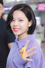 The angle and light make her look older because her face seems to have lost some of it's chubbiness. Jeongyeon Feel Special
